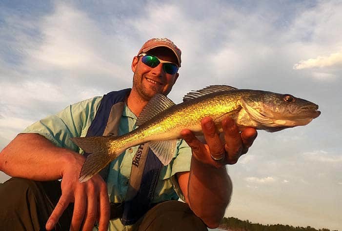 Angler holding Walleye 