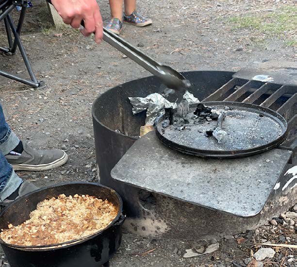 Briquettes used to heat a Dutch oven outdoors.