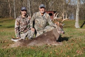 Author and his dad on our family tract with dads deer