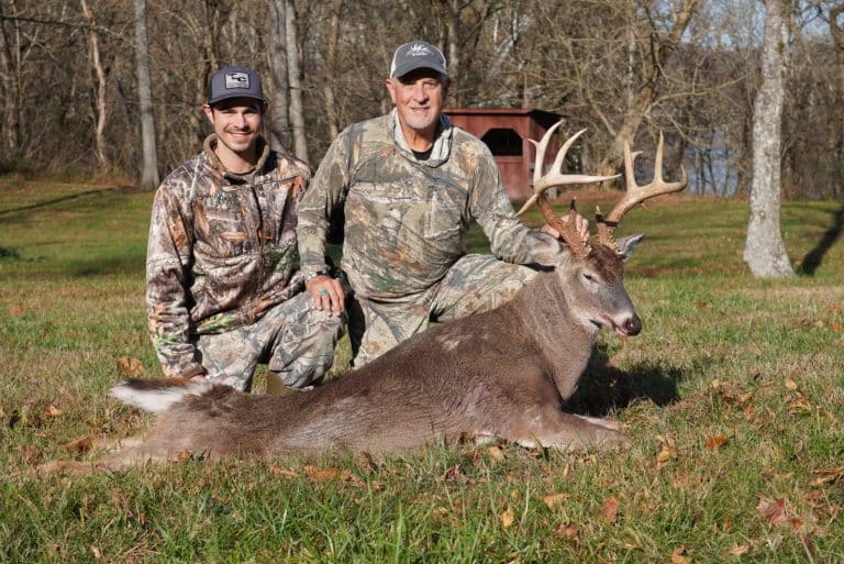 Author and his dad on our family tract with dads deer