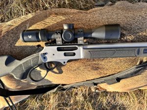 Fenson-Clash 1 - North American Deer Hunter Smith & Wesson 1854 Stealth Hunter showing optic