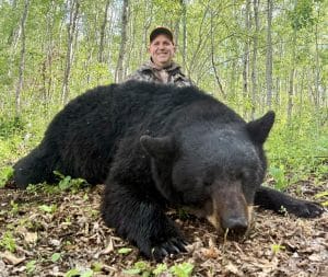 Brad Webb shot the first bear on his first evening out.