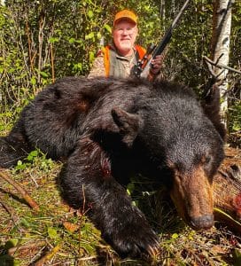 The author with a big farmland bear.