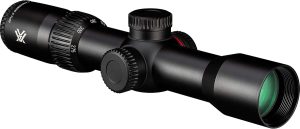 Black rifle scope with knurled adjustment knobs and a green-tinted front lens