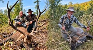 Both hunters pose with their red stags and outfitter Roman Valent from Heming Hunting