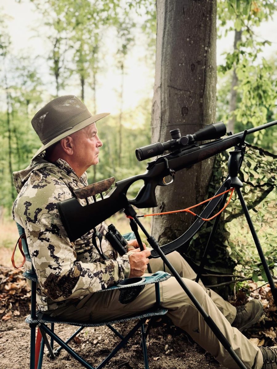 Author in shooting chair